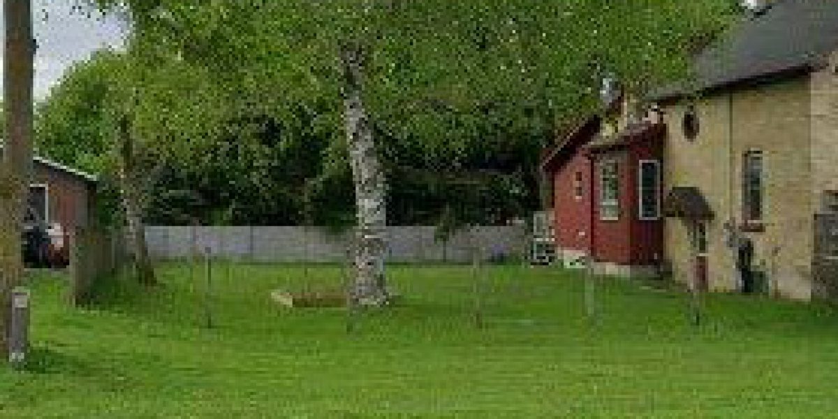 Building lot with water & sewer at the lot line!